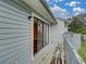 Balcony with railings and sliding glass doors to the interior at 222 Carpenters Way # 9, Lakeland, FL 33805
