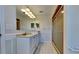 Bathroom showcasing a vanity with great storage and walk-in shower at 512 Lost Creek Ct, Kissimmee, FL 34743