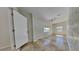 Bright bedroom with tile floors, ceiling fan, and a large doorway at 512 Lost Creek Ct, Kissimmee, FL 34743