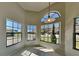 Bright dining area featuring large windows and tile flooring at 512 Lost Creek Ct, Kissimmee, FL 34743