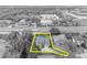 Aerial view of a property surrounded in a nice neighborhood, featuring a screened-in pool at 5406 Baytowne Place, Oviedo, FL 32765