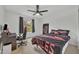 This fun themed bedroom features dark furniture and Florida State Seminole decor at 5406 Baytowne Place, Oviedo, FL 32765