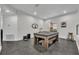 Game room featuring a combination pool/ping pong table, a stylish lamp and modern decor at 5406 Baytowne Place, Oviedo, FL 32765