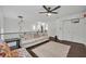 Cozy room featuring a large sofa, modern lighting, and comfortable seating at 5406 Baytowne Place, Oviedo, FL 32765