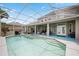 Beautiful screened-in pool with a spa and covered patio, perfect for outdoor relaxation and entertainment at 5406 Baytowne Place, Oviedo, FL 32765