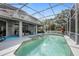Spacious screened-in pool and spa, great for outdoor living and entertaining at 5406 Baytowne Place, Oviedo, FL 32765