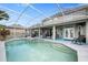 Backyard pool and patio area with screened-in enclosure, perfect for relaxation and gatherings at 5406 Baytowne Place, Oviedo, FL 32765