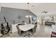 Bright dining area with a modern table and decor, offering a stylish space for entertaining at 2337 St George Ave, The Villages, FL 32162