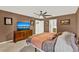 Spacious Primary bedroom with a ceiling fan at 2337 St George Ave, The Villages, FL 32162