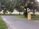 Scenic view of the road leading to a peaceful lakeside park and recreational area at 858 Lafayette Ln, Lakeland, FL 33805