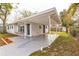 Attached carport leads to the front entry of this beautifully painted brick home at 1729 Elk Dr, Lakeland, FL 33801