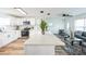 Modern, updated kitchen with white cabinets, stainless appliances, and a large center island at 1729 Elk Dr, Lakeland, FL 33801