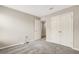 Neutral bedroom features plush carpet, closet, and bright natural light at 4381 Pumice Dr, Lakeland, FL 33811