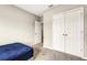 This bedroom features a closet, neutral paint, and soft carpeting at 4381 Pumice Dr, Lakeland, FL 33811