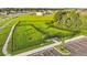 Aerial view of the community dog park, showcasing agility equipment, enclosed areas, and convenient parking at 4381 Pumice Dr, Lakeland, FL 33811