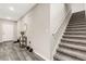 Welcoming entryway with a staircase, stylish flooring, and convenient access to the front door at 4381 Pumice Dr, Lakeland, FL 33811