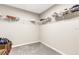 Walk-in closet with carpeted floor and wire shelving for organized storage at 4381 Pumice Dr, Lakeland, FL 33811