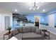 Finished basement with castle mural, mounted train, and cozy seating area at 2956 Penelope Loop, Kissimmee, FL 34746