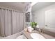 Cozy bathroom featuring a shower and a sink at 2956 Penelope Loop, Kissimmee, FL 34746