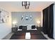 Comfortable bedroom features neutral décor, and stylish overhead lighting at 2956 Penelope Loop, Kissimmee, FL 34746