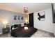 Stylishly appointed bedroom features neutral decor, and a modern ceiling light at 2956 Penelope Loop, Kissimmee, FL 34746