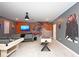 Spacious game room featuring a pool table, foosball table, and fun Harry Potter themed decor at 2956 Penelope Loop, Kissimmee, FL 34746
