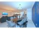 Spacious living area showcasing seamless transition from living, dining and kitchen areas in an open floor plan at 2956 Penelope Loop, Kissimmee, FL 34746