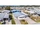 Aerial view of a charming single-story house showcasing its well-manicured front lawn, and an attached garage at 5006 Lodgewood Dr, Lakeland, FL 33810