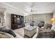 Bright living room featuring wood floors, comfortable sofas, and lots of natural light at 5006 Lodgewood Dr, Lakeland, FL 33810