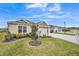 Charming home featuring a well manicured front yard and colorful landscaping, set in a peaceful neighborhood at 6922 Wendy Way, The Villages, FL 34762