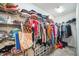 Spacious walk-in closet features shelving and clothing racks, providing ample storage solutions at 6922 Wendy Way, The Villages, FL 34762