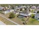 Aerial view of the home and backyard with screened pool at 6087 Sunset Vista Dr, Lakeland, FL 33812