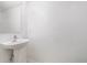 Bathroom features modern sink with bright vanity lights above, clean and functional at 6087 Sunset Vista Dr, Lakeland, FL 33812