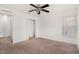 Bedroom featuring a closet and window, with neutral colored walls and carpet at 6087 Sunset Vista Dr, Lakeland, FL 33812