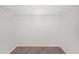 Walk-in closet with built-in wire shelving and ample storage space at 6087 Sunset Vista Dr, Lakeland, FL 33812