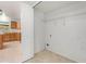Convenient laundry closet with wire shelving and connections near kitchen at 6087 Sunset Vista Dr, Lakeland, FL 33812