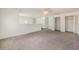 Spacious loft with plush carpeting and access to closets and living areas at 6087 Sunset Vista Dr, Lakeland, FL 33812