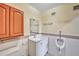 Well-lit bathroom features a white vanity, and a tiled backsplash at 9401 Cat Track Trl, Lake Wales, FL 33898