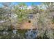 An aerial view of the house and surrounding lake and neighborhood at 3322 Heather Glynn Dr, Mulberry, FL 33860