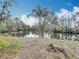 Neighborhood lake with a tree-lined shoreline at 3322 Heather Glynn Dr, Mulberry, FL 33860