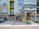 Well-maintained building entrance with accessible parking, clear signage, and modern architecture at 7517 Laureate Blvd # 4303, Orlando, FL 32827