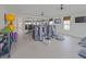 Well-equipped gym with weight machines, free weights, mirrors, and televisions for residents at 7517 Laureate Blvd # 4303, Orlando, FL 32827