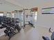 Gym featuring modern weight-lifting equipment, free weights, and fitness amenities at 7517 Laureate Blvd # 4303, Orlando, FL 32827