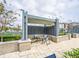 Inviting outdoor patio space featuring a stylish pergola with shade, perfect for relaxing and entertaining guests at 7517 Laureate Blvd # 4303, Orlando, FL 32827