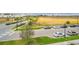 Street view featuring well-maintained landscaping, ample parking, and attractive curb appeal in a desirable neighborhood at 7517 Laureate Blvd # 4303, Orlando, FL 32827