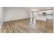 Open-concept living area featuring stylish flooring and abundant natural light at 1047 Aruba Ave, Mulberry, FL 33860