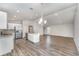 Open-concept living space with eat in kitchen and stainless steel appliances at 1047 Aruba Ave, Mulberry, FL 33860