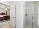Bathroom featuring a glass shower with a view into the bedroom at 11321 Ledgement Ln, Windermere, FL 34786