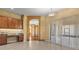 Bright breakfast nook with tile floors, built-in desk, and sliding glass doors to enjoy the outdoor view at 11321 Ledgement Ln, Windermere, FL 34786