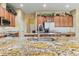 Kitchen island with custom stone countertops and stainless steel fixtures at 11321 Ledgement Ln, Windermere, FL 34786